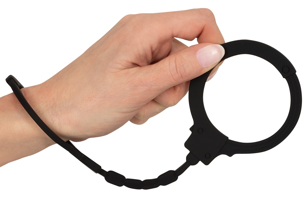 Black handcuffs in the typical design but they are made enti... Magic Shiver - Silicone Handcuffs - Black photo-2