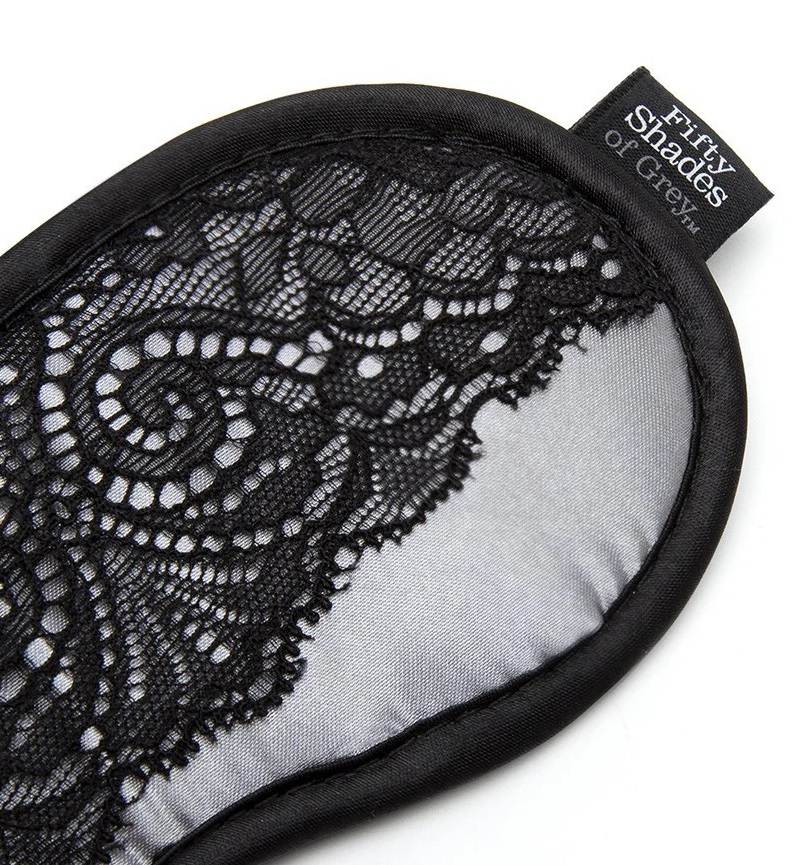 This satin blindfold keeps you in the dark, heightening your... Fifty Shades of Grey - Satin & Lace Blindfold - Grey photo-2
