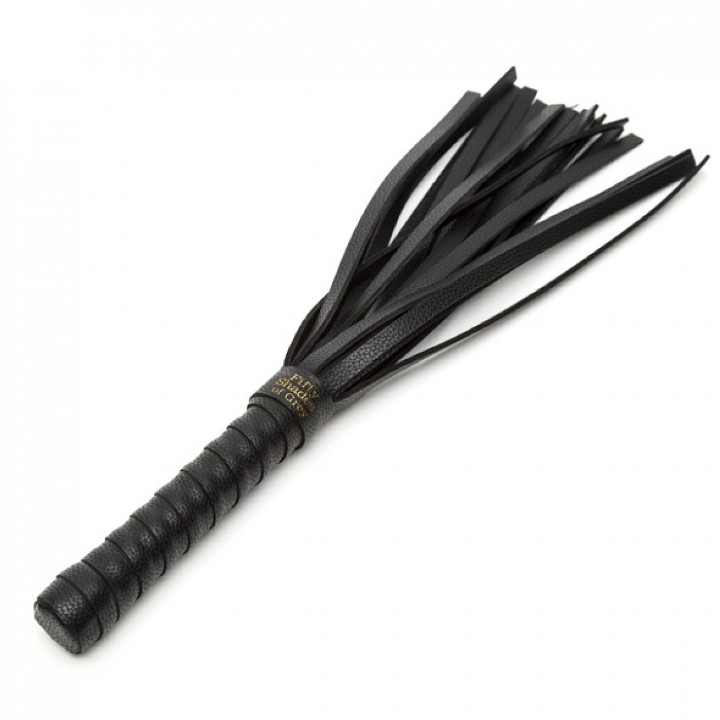 Once you open up the include gold satin storage bag, you'... Fifty Shades of Grey - Flogger Small - Black photo-2