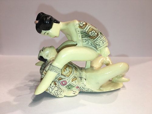 Chinese couple in Cowgirl Position photo