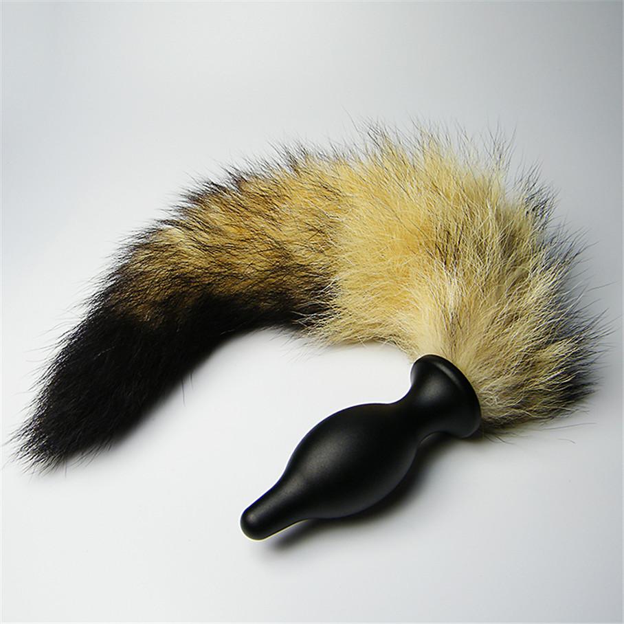 A butt plug is a sex toy that is designed to be inserted int... XFBDSM - Aluminum Alloy Tail Anal Plug M - White photo-2