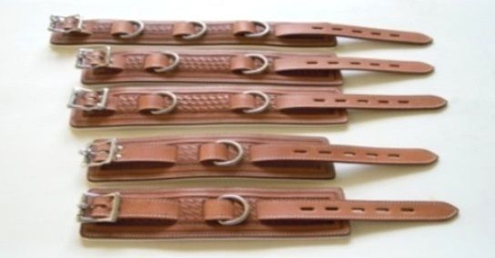 Zorbo - Tooling Natural Saddle Leather Heavy Duty Hand Cuff photo