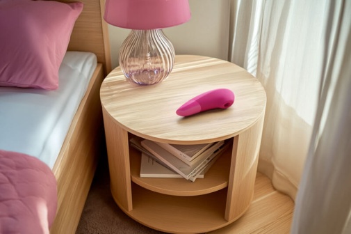 Womanizer - Enhance Pleasure Air & Deep Vibration Clit Stimulator - Vibrant Pink photo