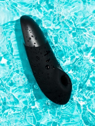 Womanizer - Enhance Pleasure Air & Deep Vibration Clit Stimulator - Black photo