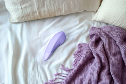 Womanizer - 增强版Pleasure Air & 深层震动 阴蒂刺激器 - 紫色 照片