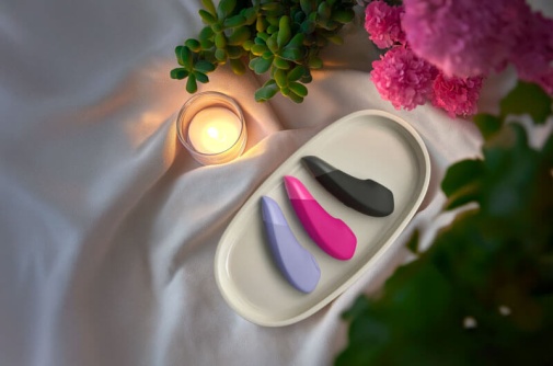 Womanizer - 增强版Pleasure Air & 深层震动 阴蒂刺激器 - 紫色 照片